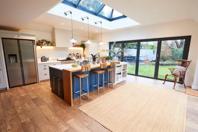 happy homeowner kitchen renovation Richmond VA modern kitchen